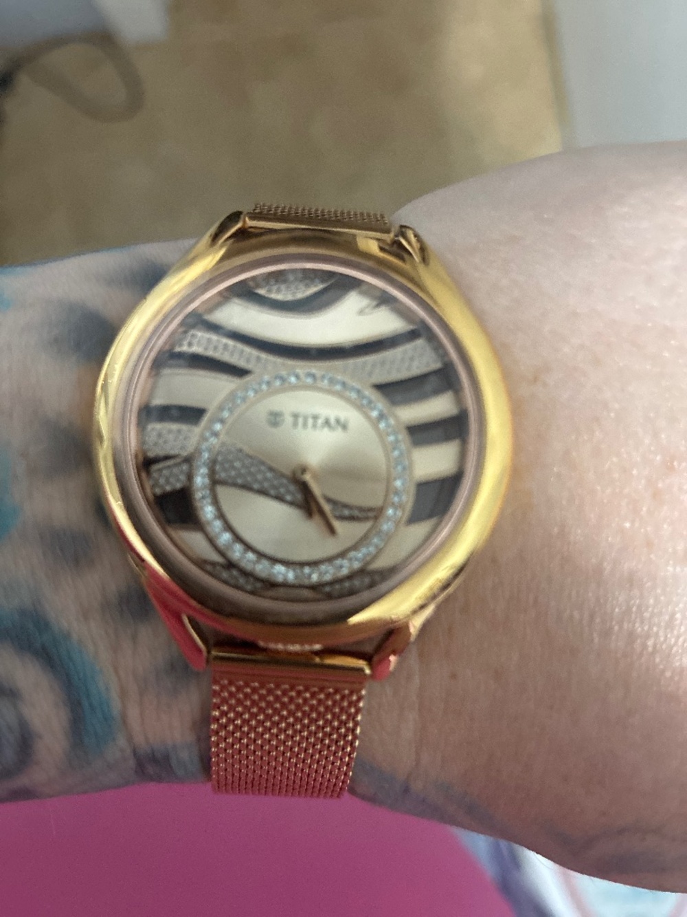 Brand new gold zebra face Titan watch